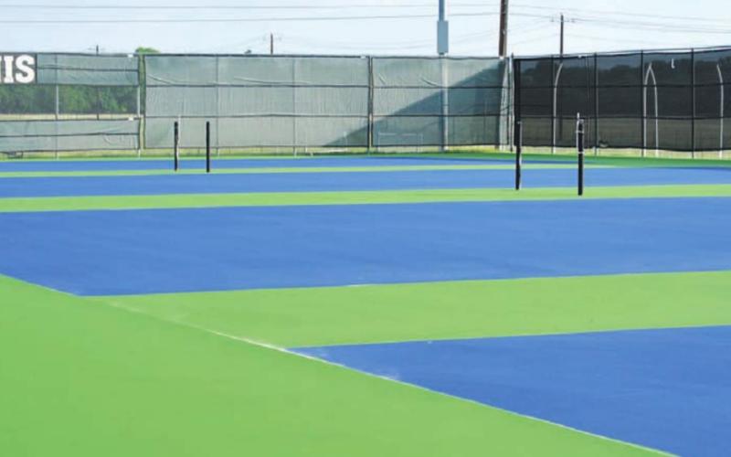 The high school tennis courts have gotten completely new surfaces. HUNTER KING | DISPATCH RECORD