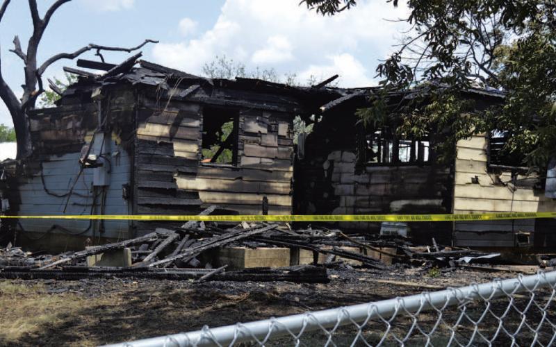 An early-morning fire Friday damaged this structure at 721 Brown St. ERICK MITCHELL | DISPATCH RECORD