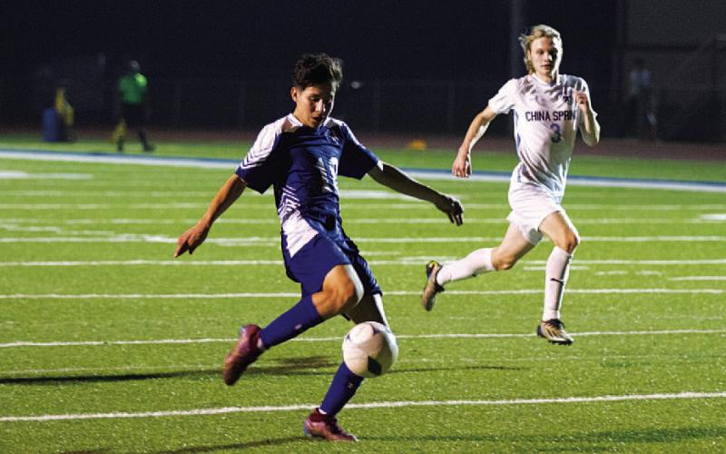 HUNTER KING | DISPATCH RECORD Edwin Alvarado Gomez takes a shot on goal during the second half of Tuesday’s match against China Spring.