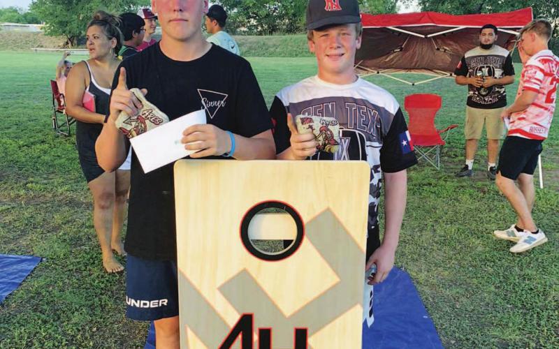 Cayhil Isom and Preston Isom were the winners of the upper bracket of the cornhole tournament which featured 72 teams. COURTESY PHOTO