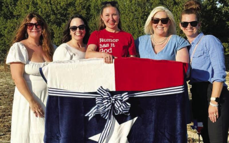 From left, Deidra Morris Nixon, Shannin Berry Johnson, Becci Scarborough Hooten, Molly Roesler Faught and Amanda Neely Patterson honor the late Catey Edwards’ love for the Lone Star State. COURTESY PHOTO