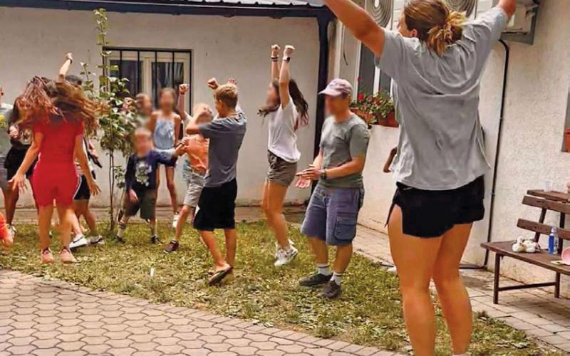 Diane Hurst, at right, brings energy to one of the youth groups she leads in Pristina, Kosovo, the capital of the Balkan state. courtesy photo
