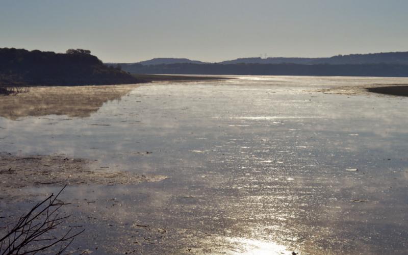 The sum shines on Stillhouse Hollow Lake, home to the Kempner Water Supply production plant. After hitting a low lake level of 601 feet in October, the water is now just above 604 feet. ERICK MITCHELL | DISPATCH RECORD