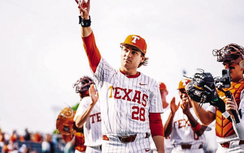 Whitehead throws the Horns up to the fans at Disch-Falk Field after the win. COURTESY PHOTO | TEXAS ATHLETICS