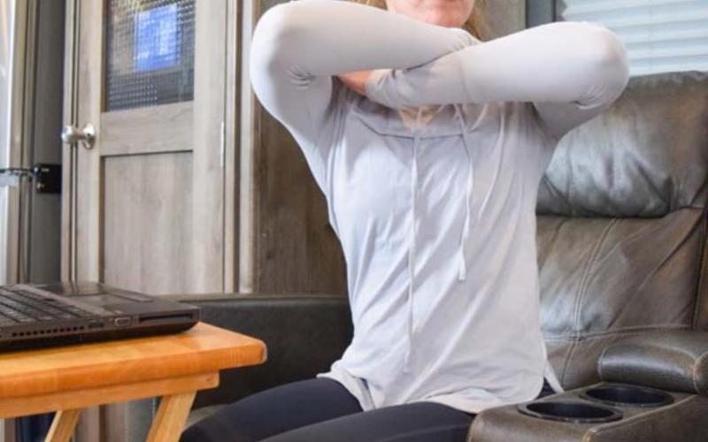For thoracic rotations, place each hand on the opposite shoulder while seated and slowly rotate your body to one side and then the other, keeping your knees pointed straight ahead. COURTESY PHOTO