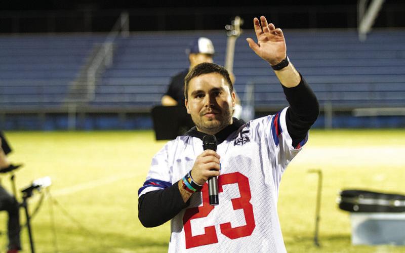 FILE PHOTO FCA coordinator Jaden Napolez speaks during last year’s Fields of Faith event.