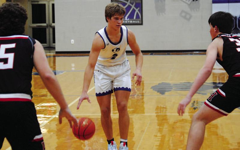 Haegan Oncken sizes up a Hamilton defender. His 15 points led the Badgers in the contest. HUNTER KING | DISPATCH RECORD