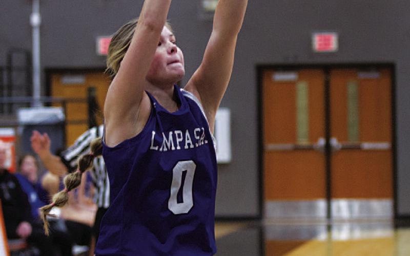 Addison Borchardt shoots a three-point shot during last Friday’s game against Llano. HUNTER KING | DISPATCH RECORD