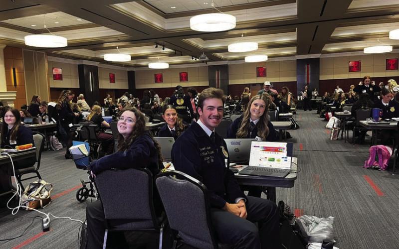 Lampasas FFA Agriculture Communications team members -- back row from left, Emory Vineyard and Chandler Boultinghouse, and front row, Cara Fitzner and Darren Tristan -- pose during the state competition held May 2-3 at Texas Tech University. COURTESY PHOTO