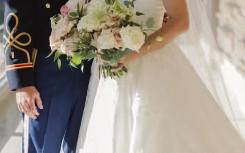 Lt. Kyle Wright and his bride, Lillian Porter, were married at the All Faiths Chapel on the campus of Texas A&amp;amp;M University. CCOURTESY PHOTO