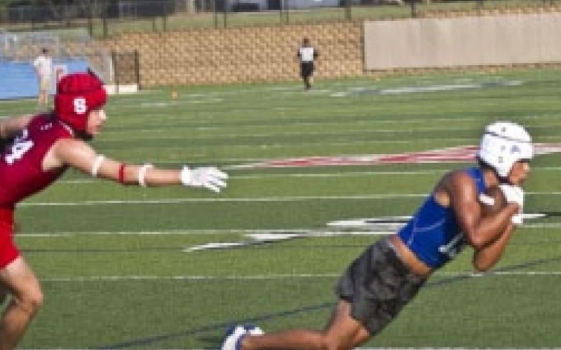 Jose Parra dives to haul in a Dax Brookreson touchdown pass at the end of the Badgers’ 7-on-7 game against Salado on Monday. JEFF LOWE | DISPATCH RECORD