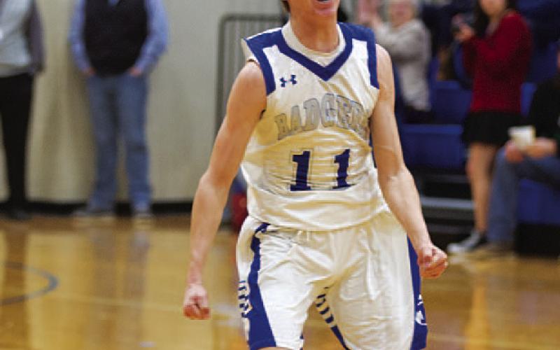 Jax Pratus screams in celebration as the final buzzer sounds. HUNTER KING | DISPATCH RECORD