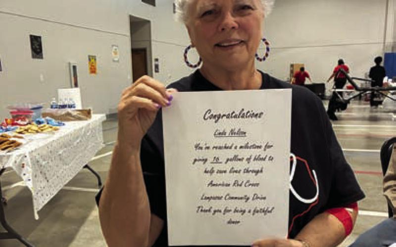 Linda Nelson was recognized at last week’s blood drive for having reached the 16-gallon milestone in cumulative donations for the American Red Cross. COURTESY PHOTO