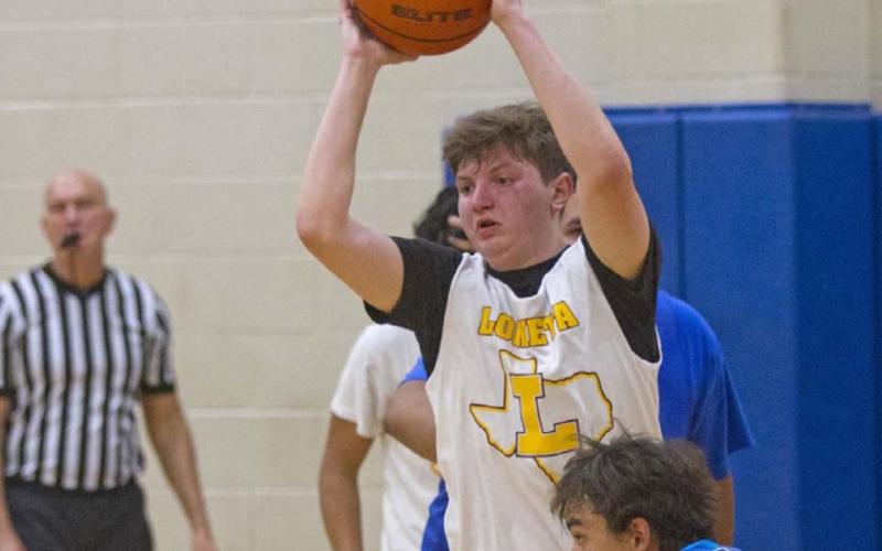 Braden Ramirez prepares to pass the ball for Lometa in a game against Priddy on Thursday. JEFF LOWE | DISPATCH RECORD
