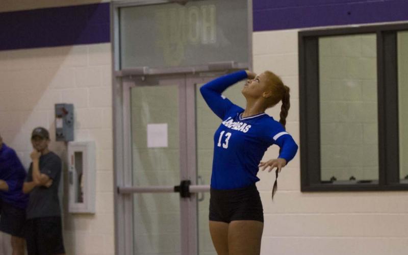 Juliana Dwamena goes up for a serve during a match in Florence earlier this season. Dwamena has been one of the team leaders in both kills and blocks this season. HUNTER KING | DISPATCH RECORD
