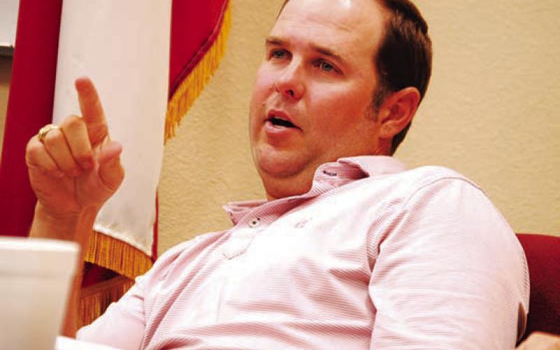 Lampasas ISD Trustee Ryan Shahan discusses with his colleagues about a new ag barn at Monday’s school board meeting. HUNTER KING | DISPATCH RECORD