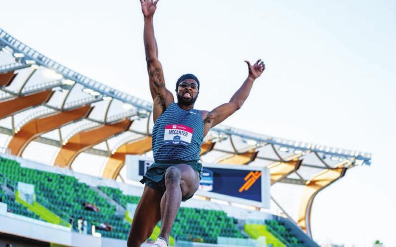 Steffin McCarter leaps through the air during the world championship qualifiers event last week. COURTESY PHOTO | TEXAS ATHLETICS