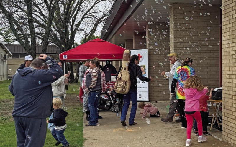 ADAM BARRIOS | DISPATCH RECORD Festival attendees enjoyed a shower of bubbles in lieu of the rainshowers that were predicted Saturday morning.