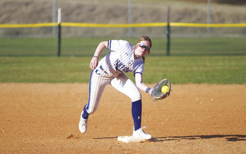 Aspen Wheeler catches the ball and steps on second base to record an out during the Lady Badgers’ game against Troy. HUNTER KING | DISPATCH RECORD