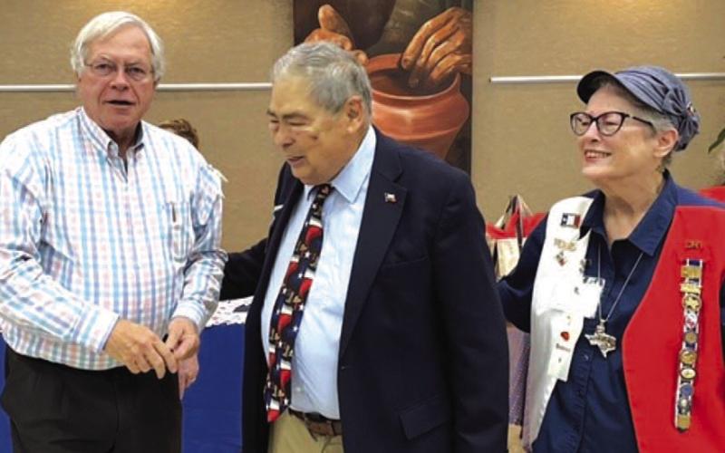Historian and author Bill O’Neal, center, talks with Mark Bumpus, who was a student of his at the Lampasas junior high in the 1960s. DRT member Judy Smith, O’Neal’s sister, stands beside him. She introduced O’Neal at last week’s District V gathering. COURTESY PHOTO