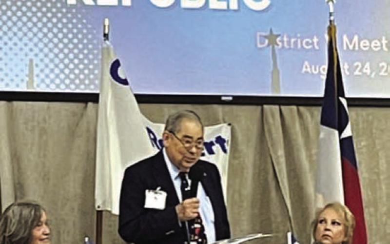 Former state historian Bill O’Neal speaks from the podium to a large group of Daughters of the Republic of Texas members. COURTESY PHOTO