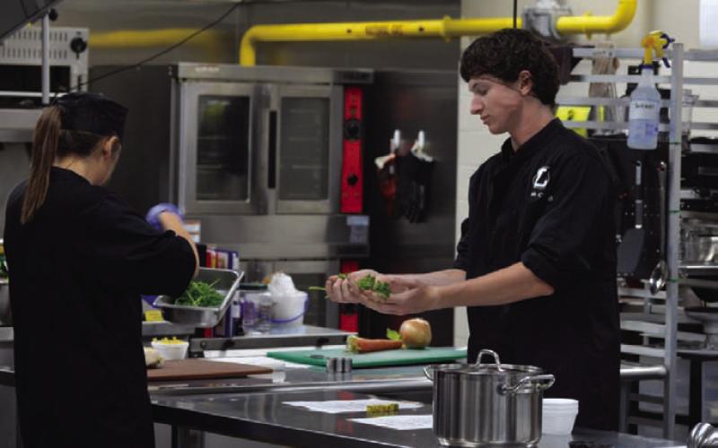 Culinary students are always together working toward success in the Badger Bistro kitchen. ERICK MITCHELL | DISPATCH RECORD