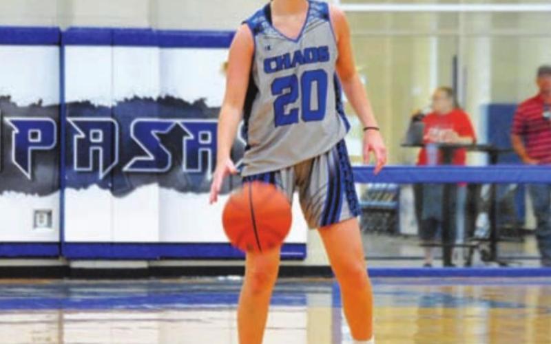Addison Borchardt dribbles at the top of the key during the Lady Badgers’ game against San Saba. HUNTER KING | DISPATCH RECORD
