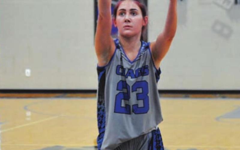 Payton Tatum follows through on her free-throw attempt during summer league on Monday. HUNTER KING | DISPATCH RECORD