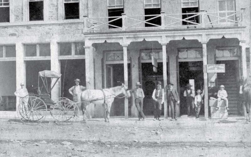Buildings around downtown square served as courthouse sites prior to 1884