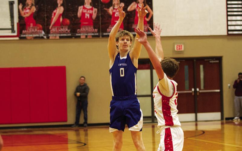 Peyton Sisson shoots over an outstretched hand for one of his three-point shots against Salado. HUNTER KING | DISPATCH RECORD