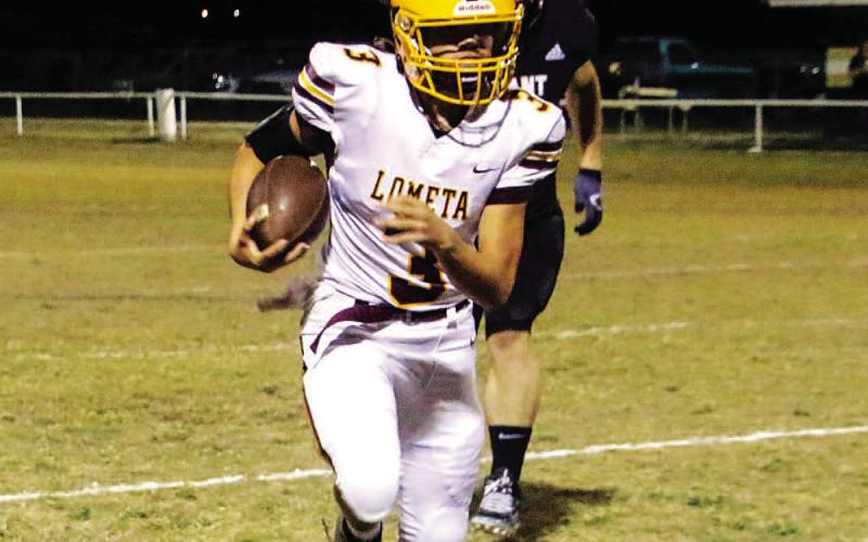 Jordan Livesay runs the ball during Friday’s game with Evant. COURTESY PHOTO | MEGAN LUSTY
