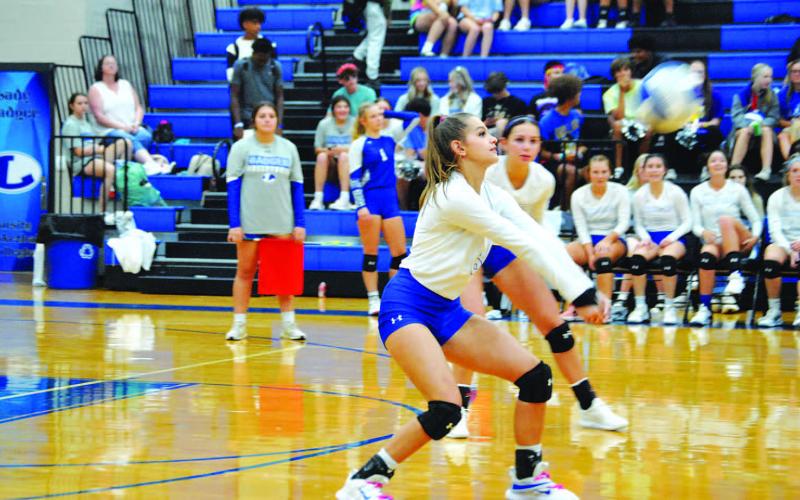 Kayli Syx bumps to a teammate during a home game against Gatesville earlier this season. HUNTER KING | DISPATCH RECORD