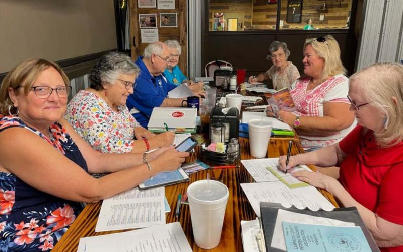 The Lampasas County Retired Teachers Association will start regular meetings again the first Tuesday in September. Planning the upcoming programs are Executive Committee members, clockwise from left, Janie Edwards, Sherry Boultinghouse, Bill and Sandy Brister, Charlene Ruzicka, Juli Chaney and Julia Phillips. Courtesy photo