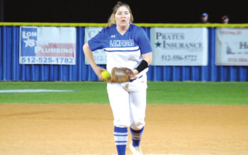 Caitlyn Sanguinet begins to wind and throw a pitch to a Ballinger hitter. HUNTER KING | DISPATCH RECORD