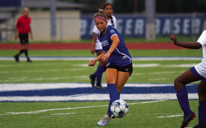 HUNTER KING | DISPATCH RECORD Ever Richardson plays a pass during the Lady Badgers’ match against Jarrell. She made multiple assists during the short season in 2024.