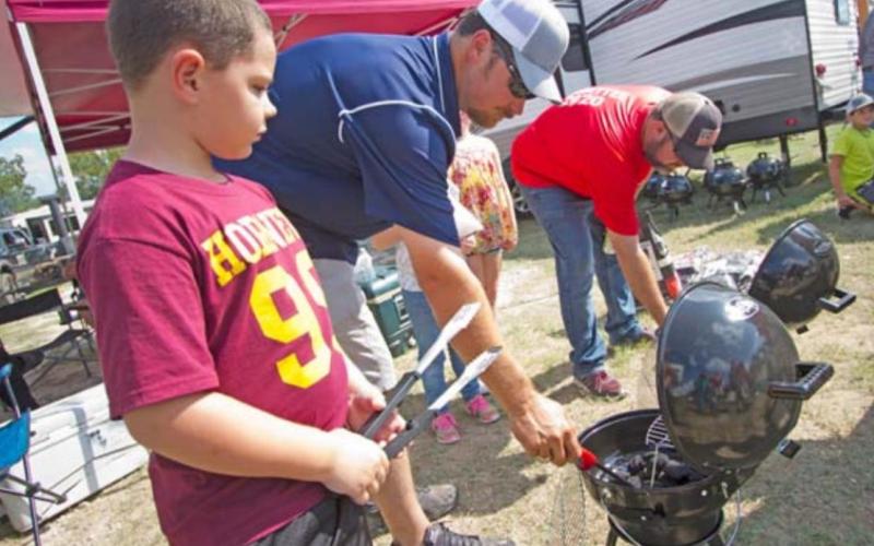 Light the grills for Kids’ Que