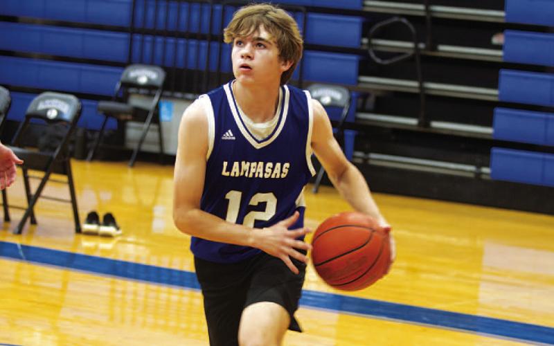 Jax Pratus drives the baseline to finish at the rim in the first spring game of the year for Lampasas. HUNTER KING | DISPATCH RECORD