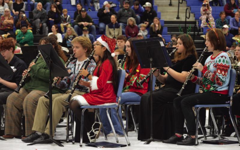 The Lampasas High School Wind Ensemble and Symphonic Band clarinet section perform during last week’s Christmas concert at the LHS gymnasium. ERICK MITCHELL | DISPATCH RECORD