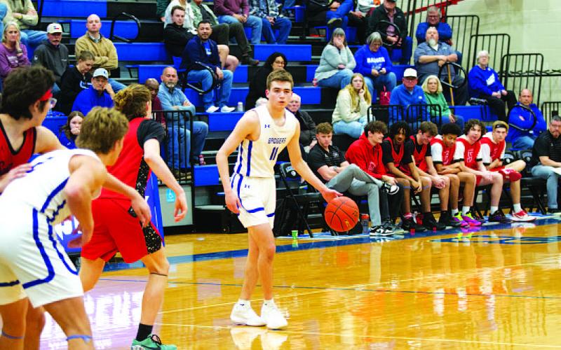 HUNTER KING | DISPATCH RECORD Jax Pratus dribbles the ball up top and looks to pass to a teammate.