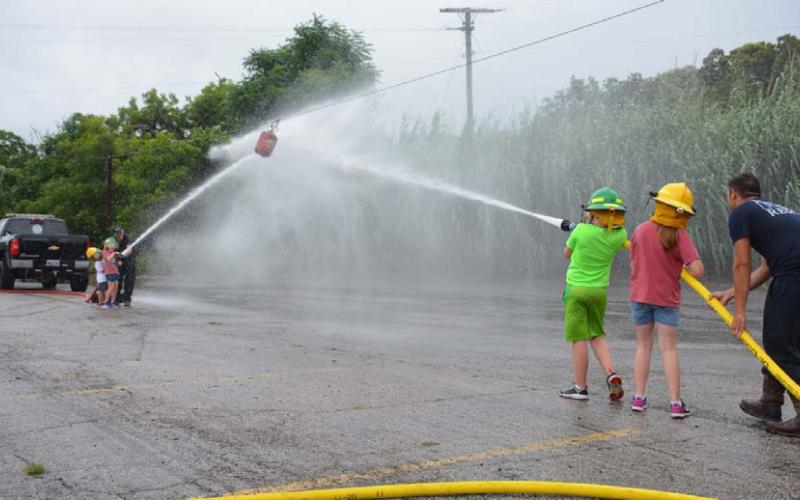 The Lampasas Volunteer Fire Department offers its version of “water polo” during Kids’ Day Activities. FILE PHOTO