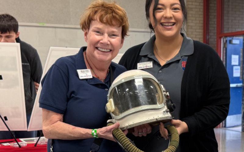 ADAM BARRIOS | DISPATCH RECORD From left, Maureen Adams and Anjelicca Spruce from the Central Texas College Mayborn Science Theater provided insight to attendees on the state-of-the-art facility that re-creates the night sky.