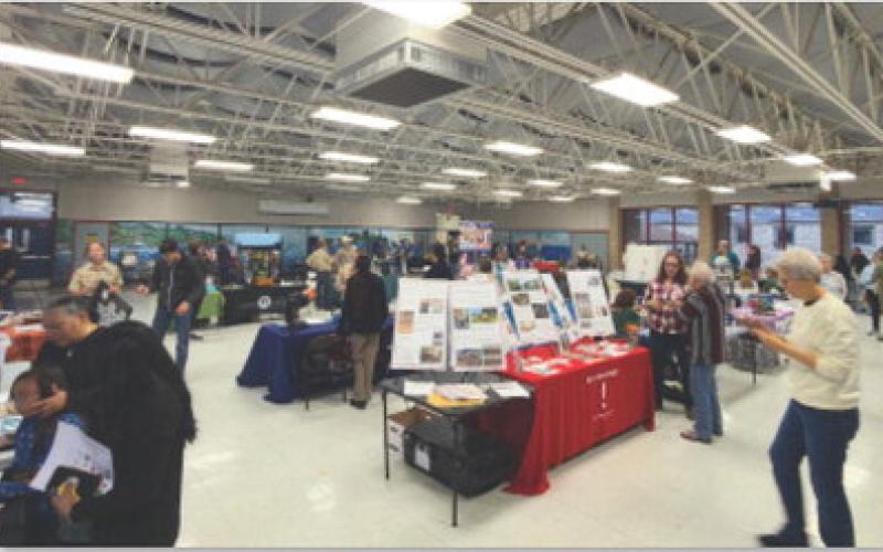 The old Lampasas Middle School cafeteria was filled with different educational vendors for The Stars at Night event on Saturday. ADAM BARRIOS | DISPATCH RECORD