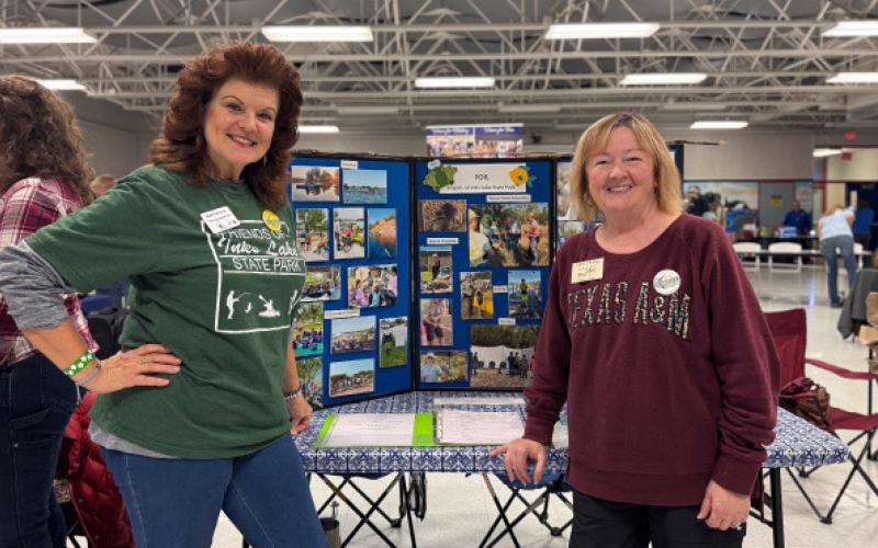 ADAM BARRIOS | DISPATCH RECORD Fron left, Betty Secrest and sTerry Stracke from Friends of Inks Lake (FOIL) provided attendees with details on the Burnet-based state park.