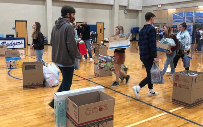 Lampasas High School students collected donations in the school gymnasium during a previous year’s Angel Tree event. Courtesy photo