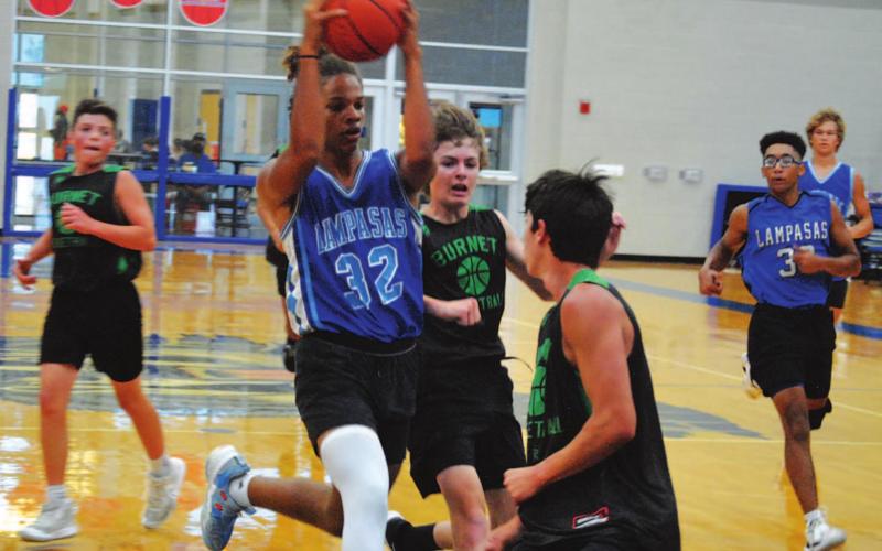 Cameron Stokes goes to the rim for a layup in the first summer league game. HUNTER KING | DISPATCH RECORD