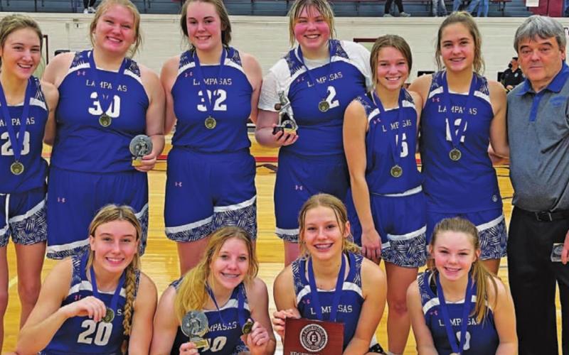 The Lady Badgers pose with their trophies from the San Antonio Edgewood tournament. COURTESY PHOTO