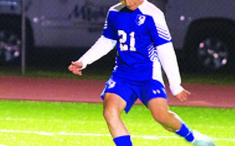 HUNTER KING | DISPATCH RECORD Juancho Rivera Munoz sends a free kick toward the goal.