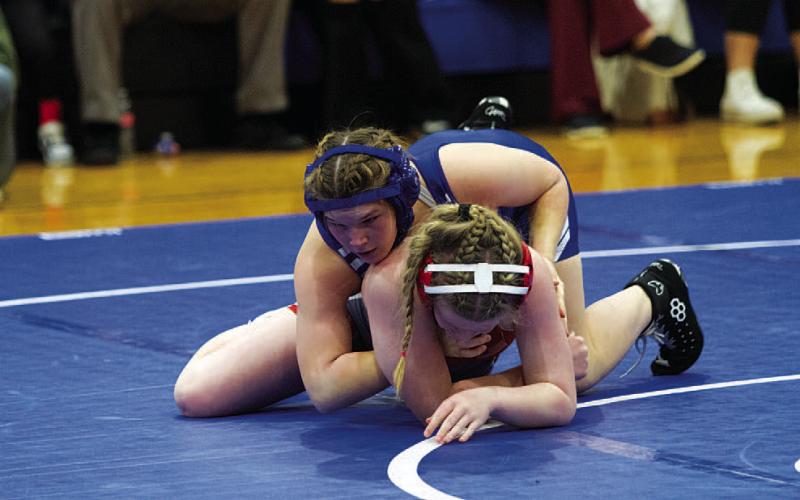 Taylor Martell and her team are wrestling at the THSWCA State Duals. The district wrestling meet will be held Jan. 29 at Burleson High School. HUNTER KING | DISPATCH RECORD