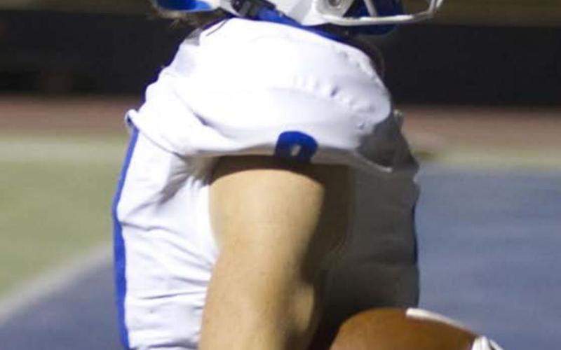 Nate Borchardt walks into the end zone for his third touchdown of the night, tying the game at 21. HUNTER KING | DISPATCH RECORD