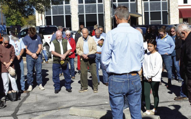 American Legion Post 277 Commander Steve Cook asked attendees at Tuesday’s Veterans Day celebration to participate in a two-minute period of silence. The event was held on the northwest side of the Lampasas County Courthouse. COURTESY PHOTO